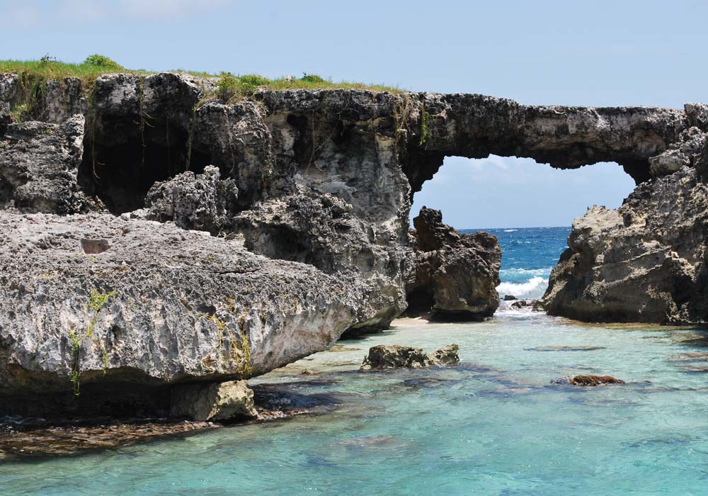 antigua-gallery2 Rock formation with natural arch by the Caribbean Sea