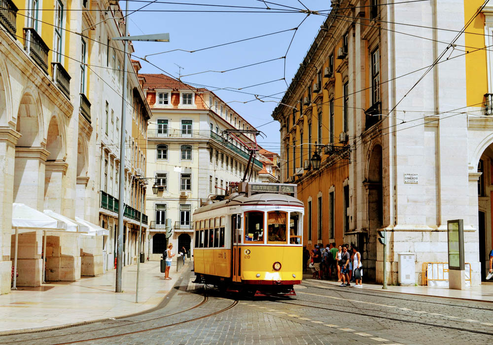 portugal-gallery6 Iconic yellow tram in the streets of Lisbon, Portugal